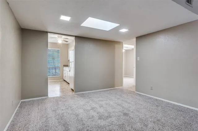 an empty room with a bathroom