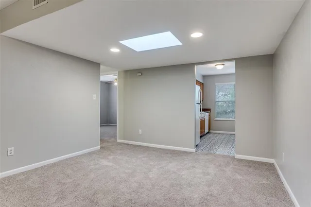 a kitchen that has a stove and a microwave