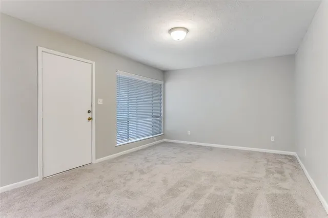 a view of a livingroom and a window