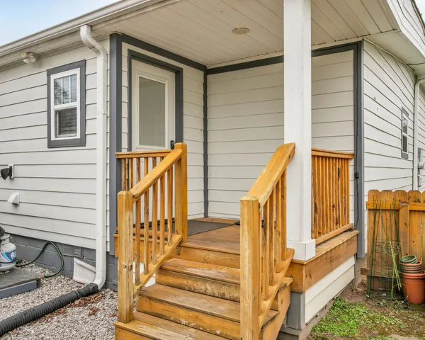 a city view with tall buildings and a big yard