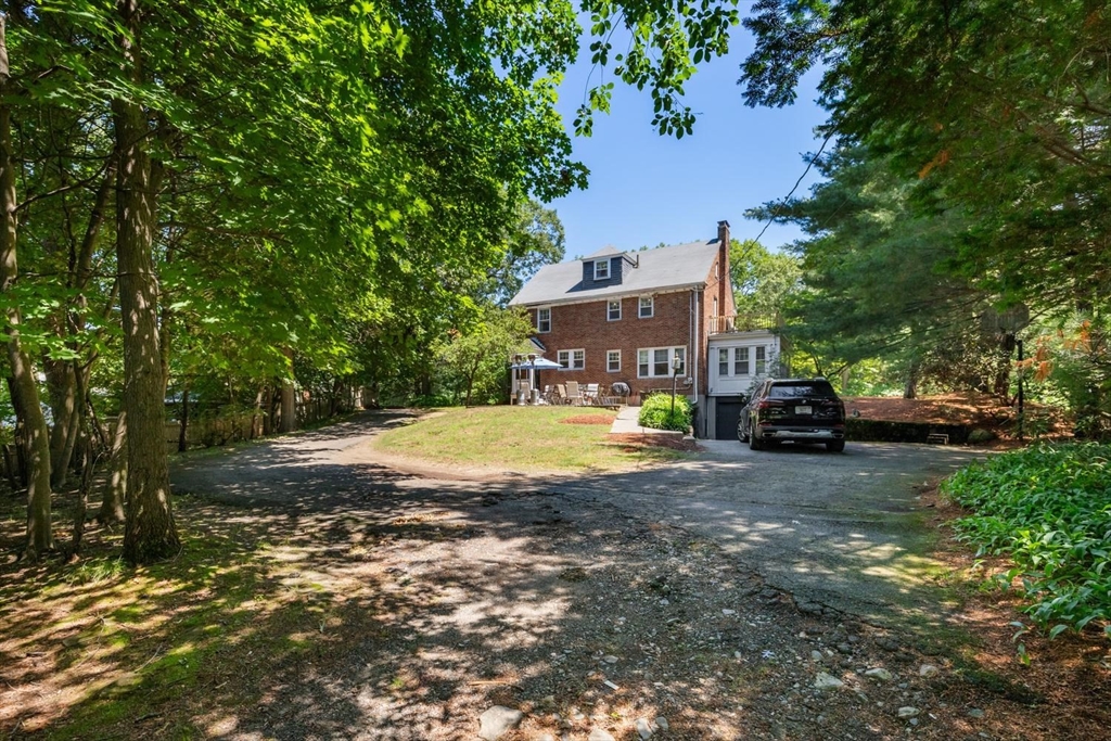 114 South Border Road Medford, MA 02155 - Photo 4 of 36 a view of a house with a yard
