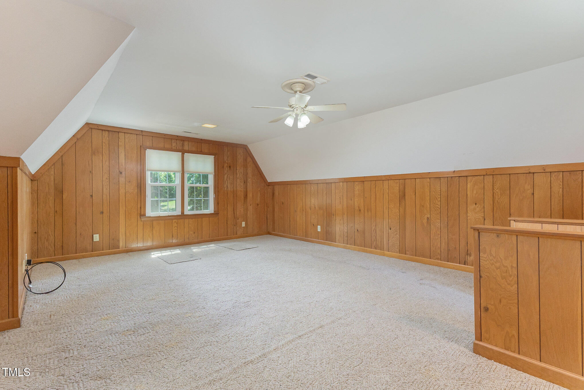 6909 Brook Ridge Court Raleigh, NC 27615 - Photo 24 of 60 Huge bonus room with so many potential uses. Back stair case leads to downstairs family room.