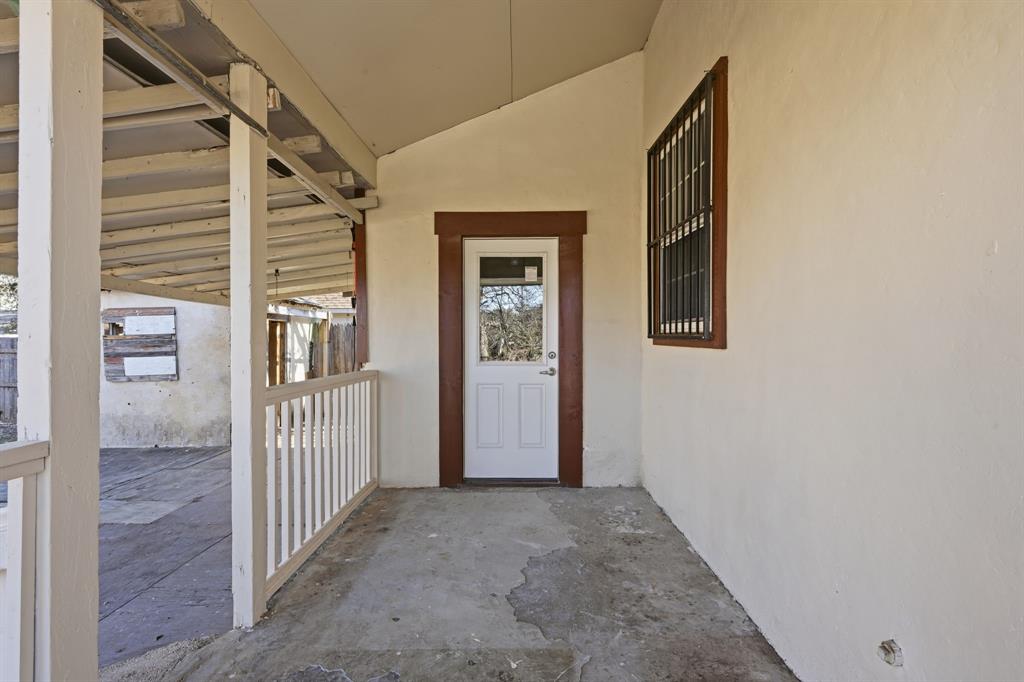 4219 Frank Street Dallas, TX 75210 - Photo 20 of 23 a view of a hallway with wooden floor and entryway