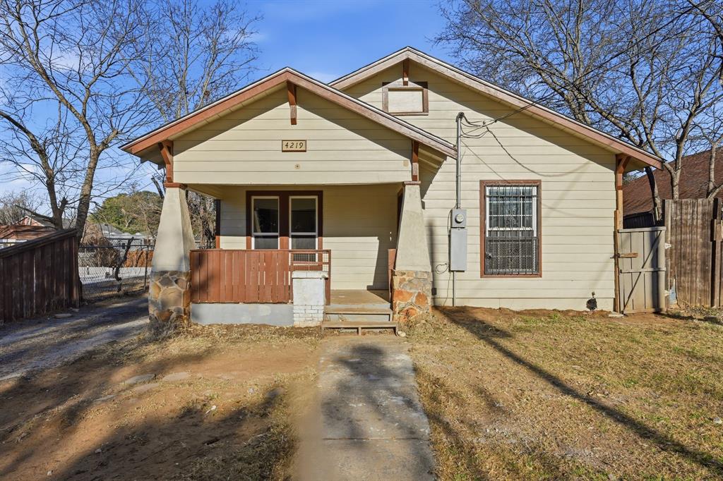 4219 Frank Street Dallas, TX 75210 - Photo 23 of 23 a front view of a house with a yard