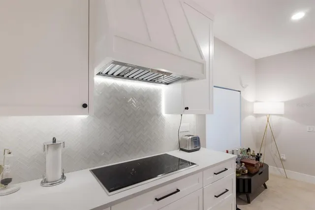 a bathroom with a bathtub and a sink