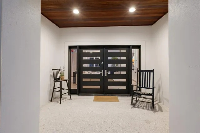 a view of a lobby with black and white walls