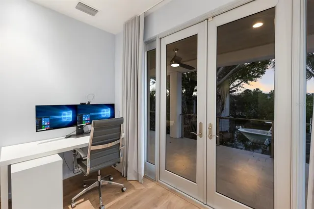 a bathroom with a shower and a mirror