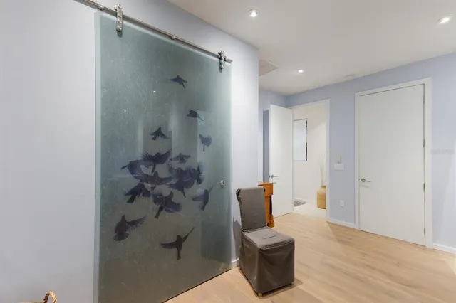 a view of swimming pool with seating space