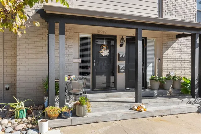 a building outdoor space with potted plants