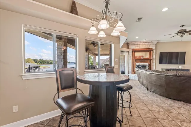 a bedroom with a bed and large window