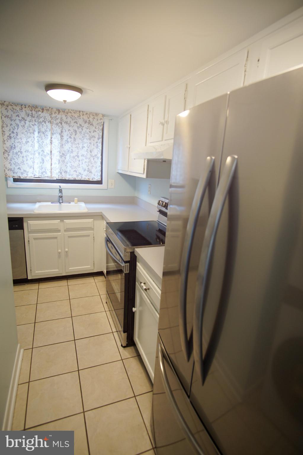 7 Mariners Way, Unit 2 Stevensville, MD 21666 - Photo 5 of 25 Bright and inviting kitchen space.