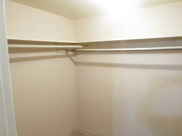 a view of small space with racks on the wall