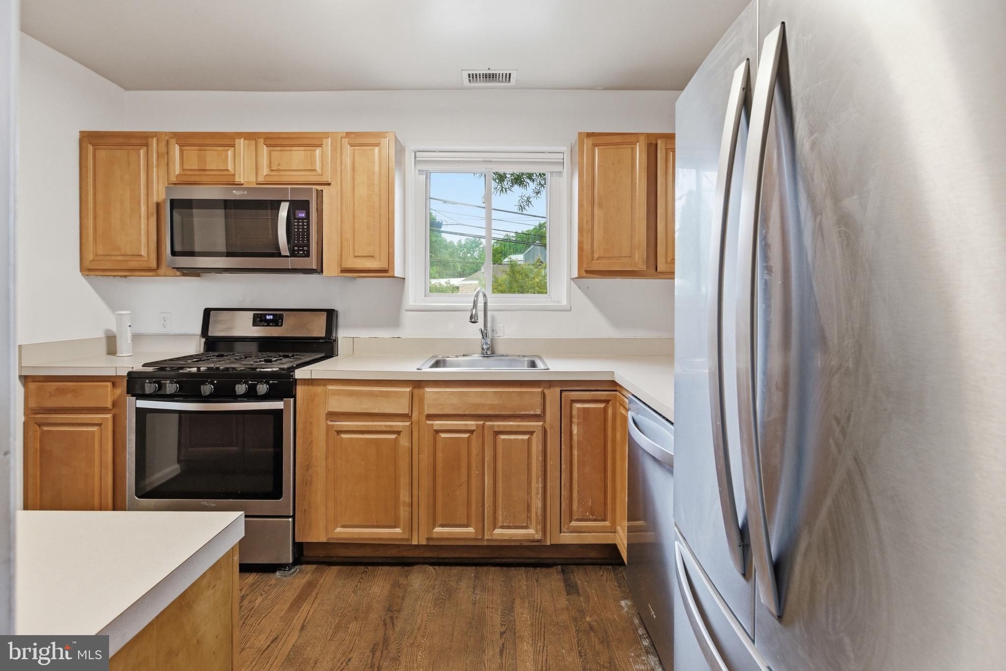 6801 Adelphi Road University Park, MD 20782 - Photo 7 of 26 The kitchen has plenty of room for meal prep.
