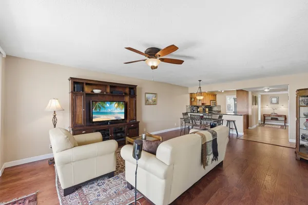 a kitchen with stainless steel appliances granite countertop a stove sink and cabinets