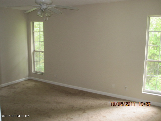 5103 Damascus Road West Jacksonville, FL 32207 - Photo 17 of 23 an empty room with a window