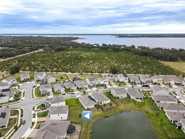 an aerial view of a city with lots of residential buildings