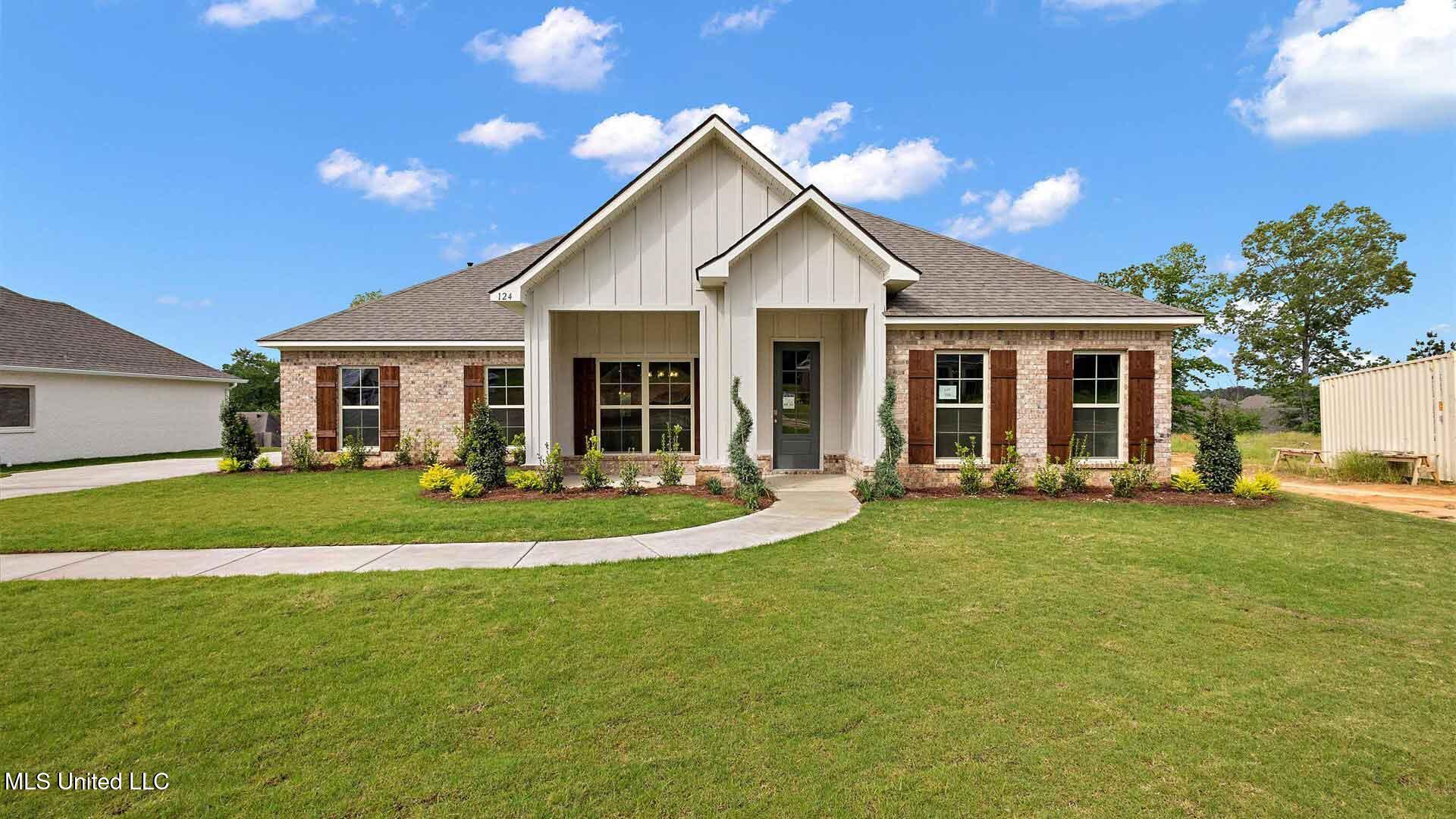 703 Honeysuckle Loop Canton, MS 39046 - Photo 1 of 44 The McKenzie in Woodgate