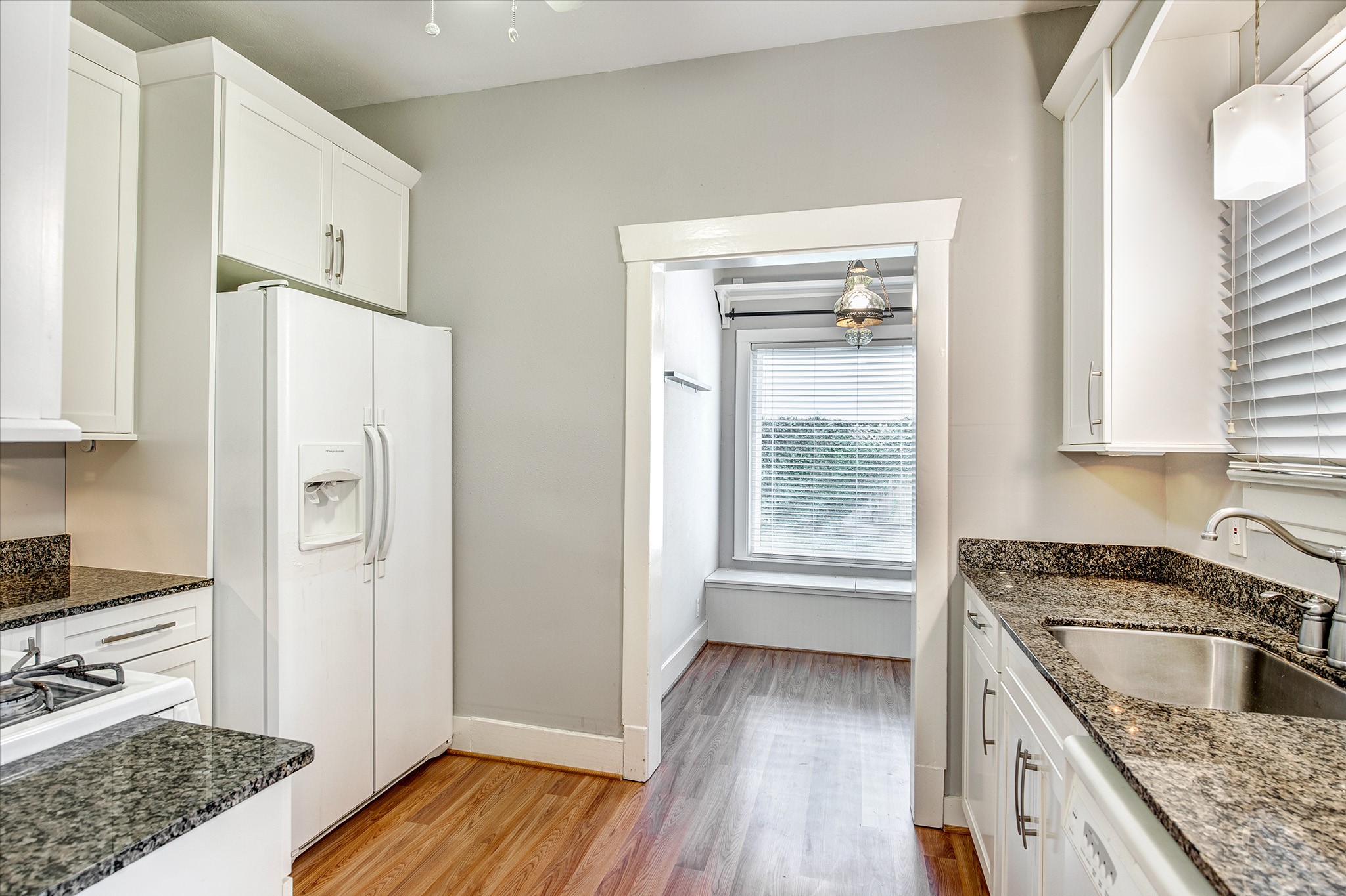 2219 Singleton Street Houston, TX 77008 - Photo 7 of 21 Refrigerator included!! Mudroom looks out to the backyard with side entrance.