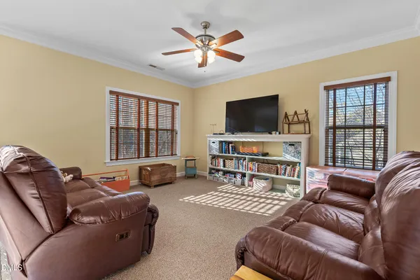 a view of a balcony with furniture