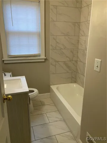 a bathroom with a bathtub