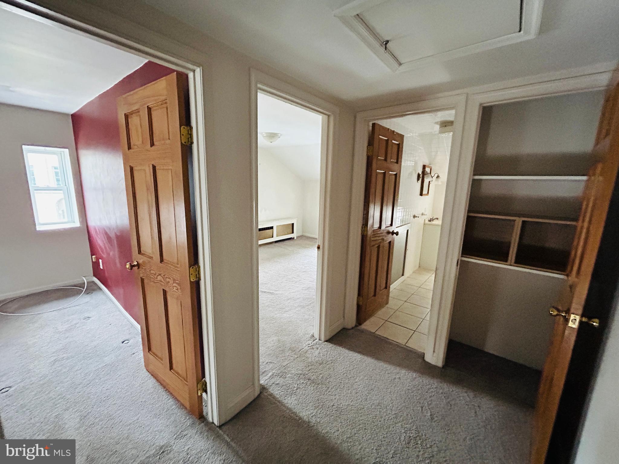 6500 Ridge Avenue, Unit 2 Philadelphia, PA 19128 - Photo 16 of 17 a view of a hallway with cabinets