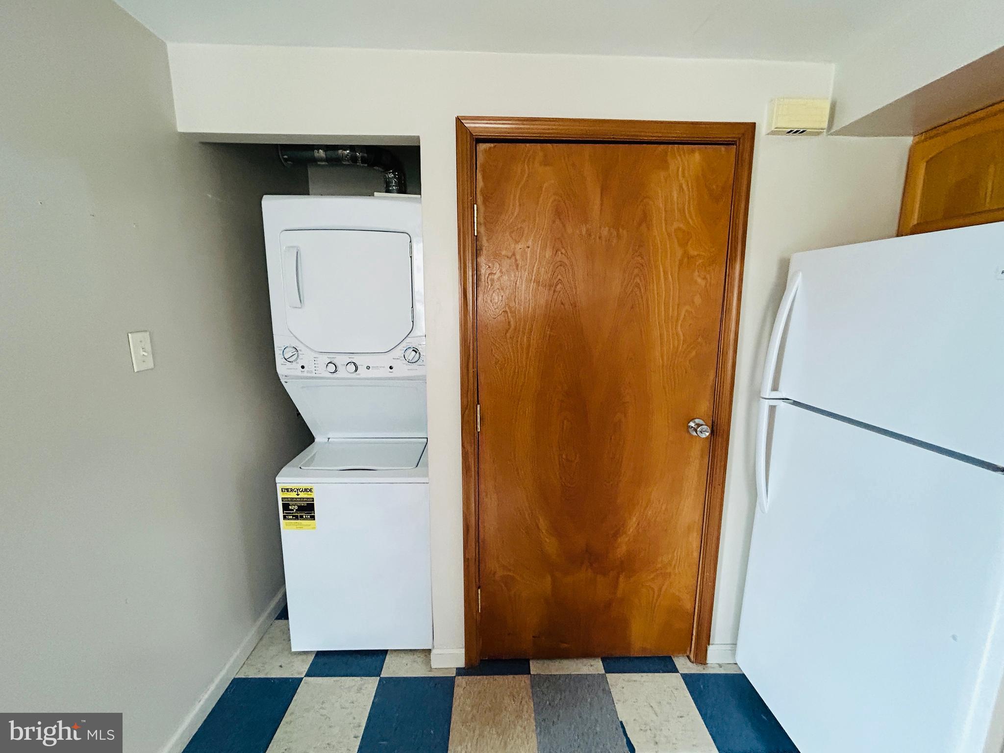 6500 Ridge Avenue, Unit 2 Philadelphia, PA 19128 - Photo 7 of 17 a utility room with dryer and washer