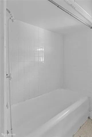 a close up of a bathtub curtain