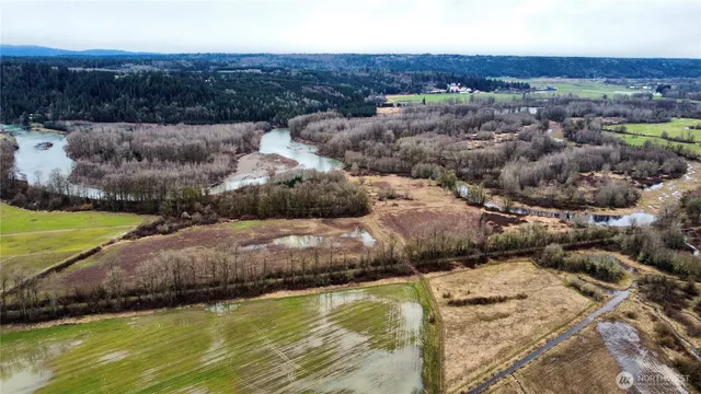 a view of a lake with mountains in the background