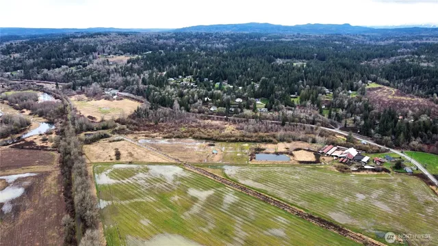 a view of a town with mountains in the background