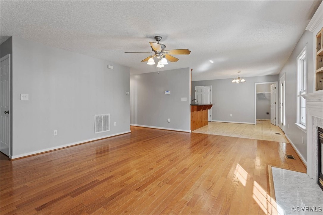 4713 Takach Road Prince George, VA 23875 - Photo 11 of 35 Unfurnished living room with light hardwood / wood