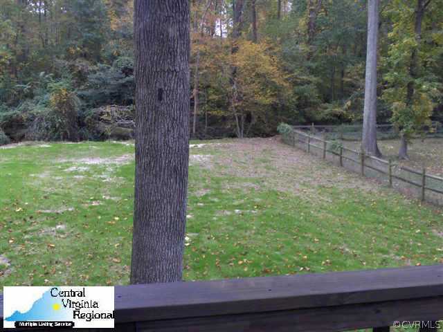 15609 Roland View Drive Chester, VA 23831 - Photo 2 of 7 a view of backyard with green space