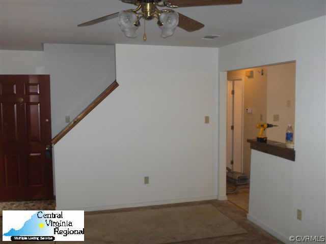 15609 Roland View Drive Chester, VA 23831 - Photo 4 of 7 a view of a livingroom with a fireplace
