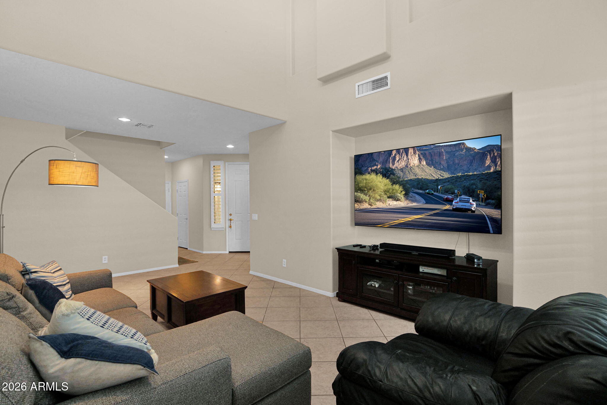 1024 East Frye Road, Unit 1092 Phoenix, AZ 85048 - Photo 14 of 35 a living room with furniture and a flat screen tv