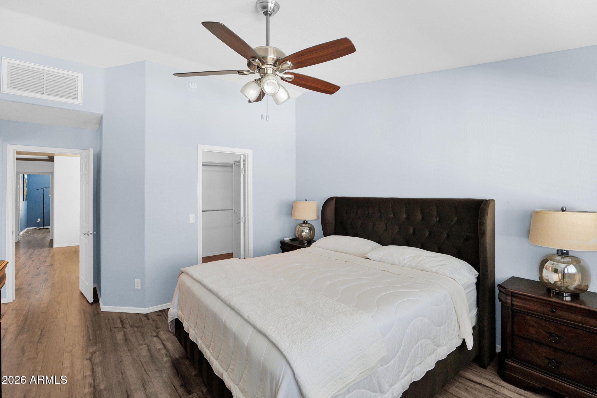 1024 East Frye Road, Unit 1092 Phoenix, AZ 85048 - Photo 17 of 35 a bedroom with a bed and wooden floor