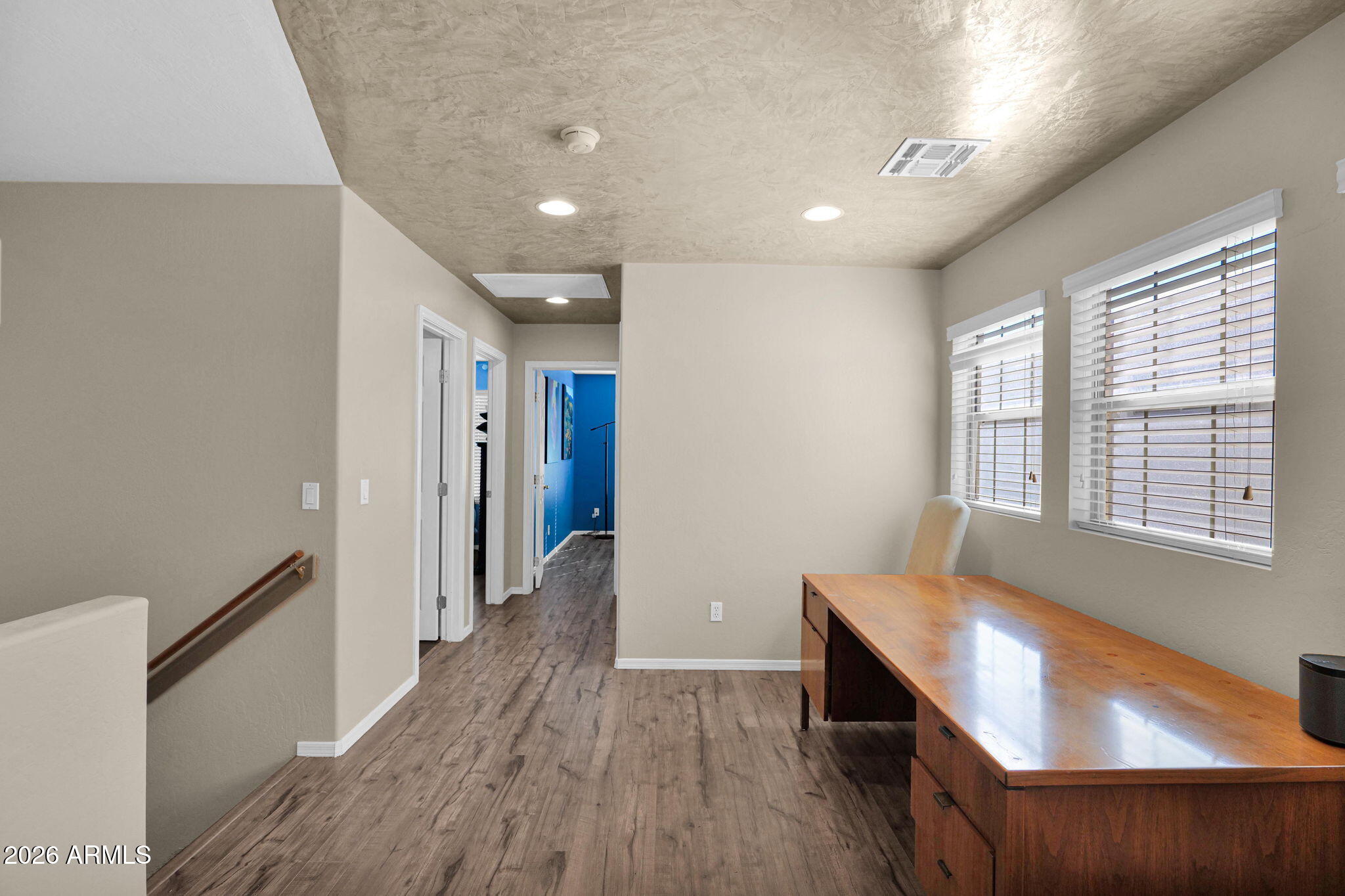 1024 East Frye Road, Unit 1092 Phoenix, AZ 85048 - Photo 24 of 35 a view of hallway with furniture and wooden floor