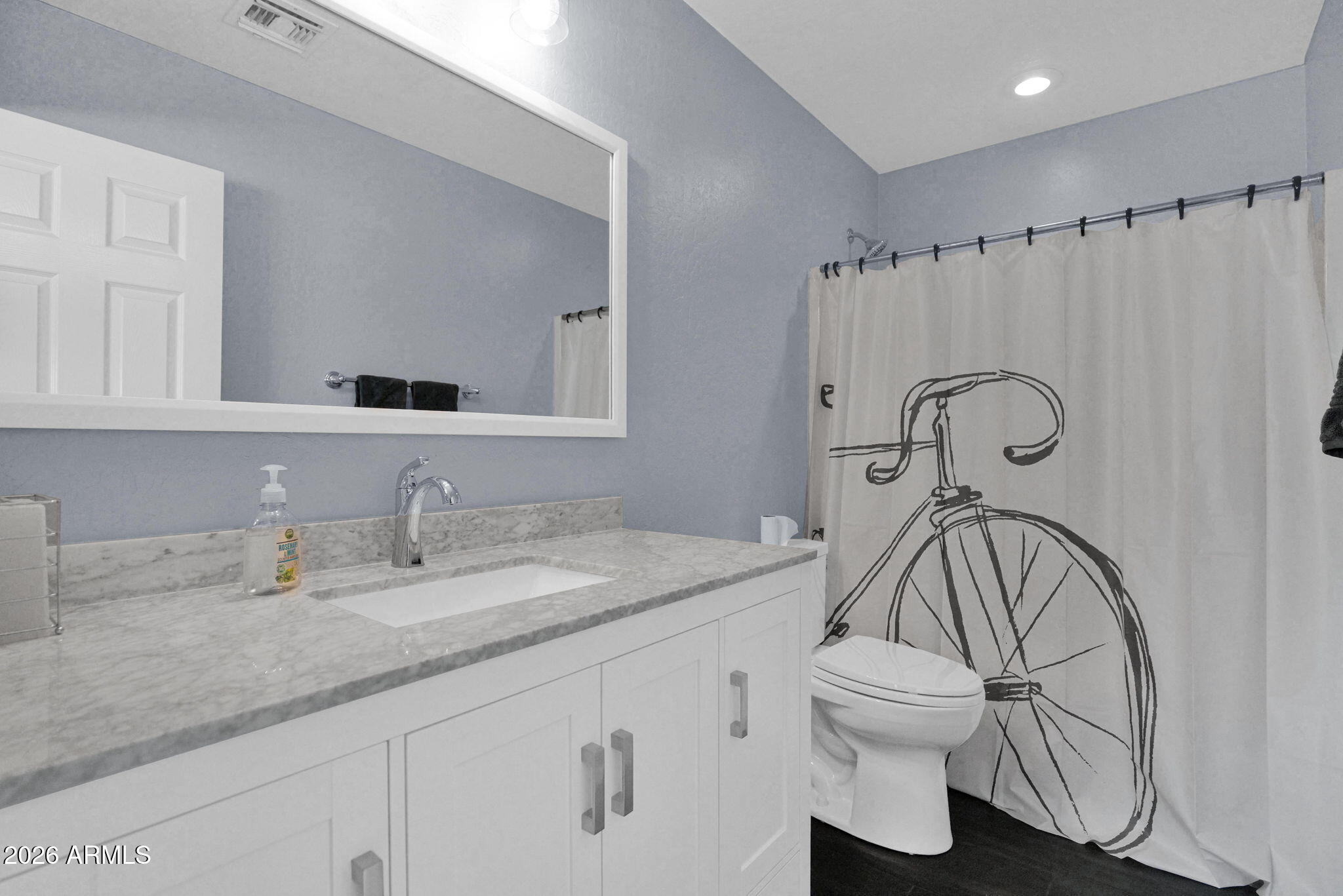 1024 East Frye Road, Unit 1092 Phoenix, AZ 85048 - Photo 28 of 35 a bathroom with a granite countertop sink toilet and a mirror
