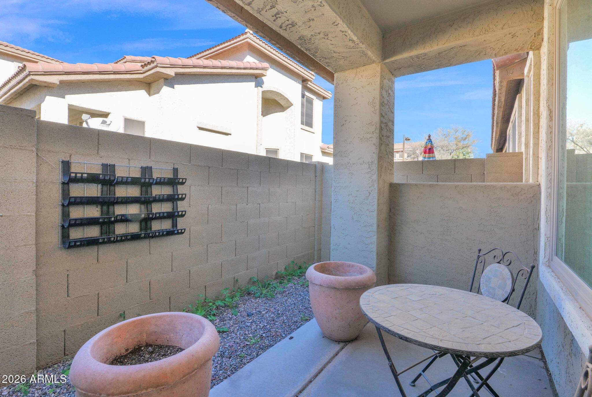 1024 East Frye Road, Unit 1092 Phoenix, AZ 85048 - Photo 31 of 35 a bathroom with a toilet a sink and a window
