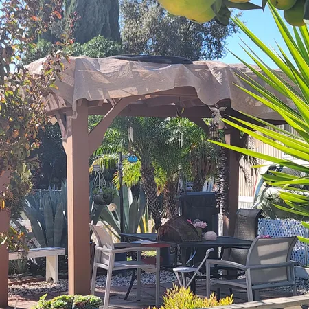 a view of house with yard