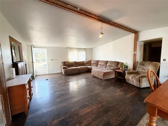 a kitchen with stainless steel appliances granite countertop a stove and cabinets