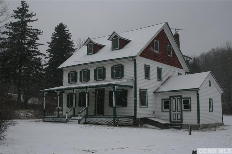 78 Lustig Road Hunter, NY 12485 - Photo 1 of 10 a front view of a house with a yard