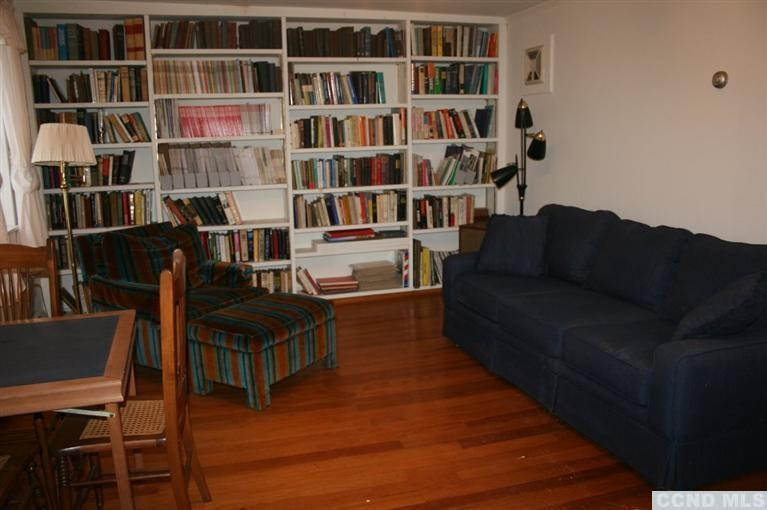 78 Lustig Road Hunter, NY 12485 - Photo 8 of 10 a living room with furniture and a book shelf