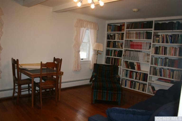 78 Lustig Road Hunter, NY 12485 - Photo 9 of 10 a view of a workspace with furniture and wooden floor