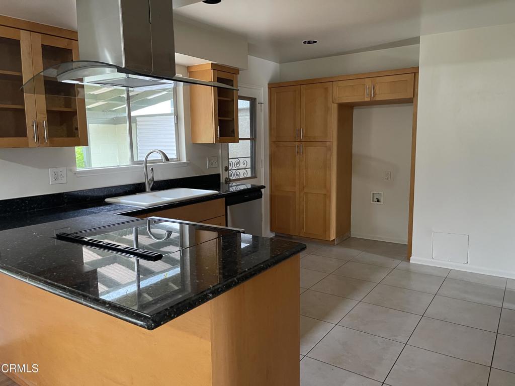 1908 Sorrel Street Camarillo, CA 93010 - Photo 5 of 5 a kitchen with stainless steel appliances granite countertop a sink and a refrigerator