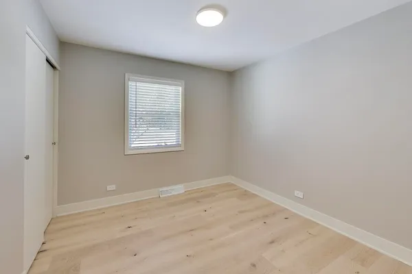 an empty room with window