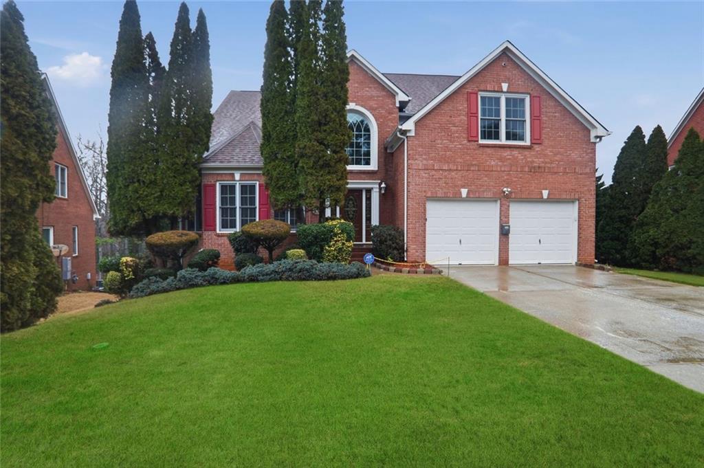 632 Grande View Stone Mountain, GA 30087 - Photo 1 of 46 front view of house with a yard