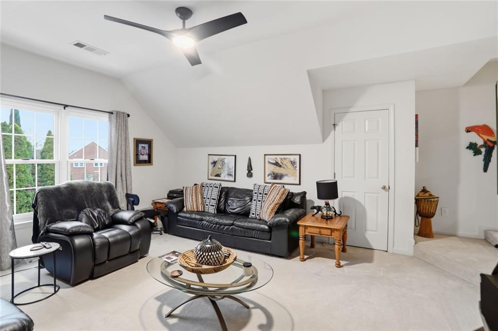 632 Grande View Stone Mountain, GA 30087 - Photo 26 of 46 a living room with furniture and a window