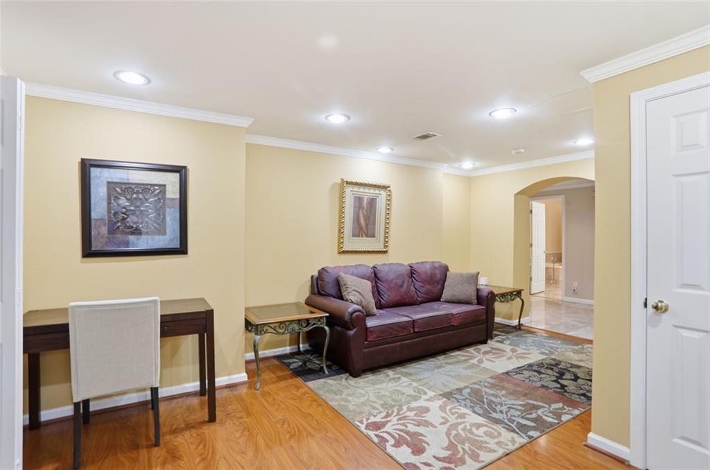 632 Grande View Stone Mountain, GA 30087 - Photo 31 of 46 a living room with furniture and a rug