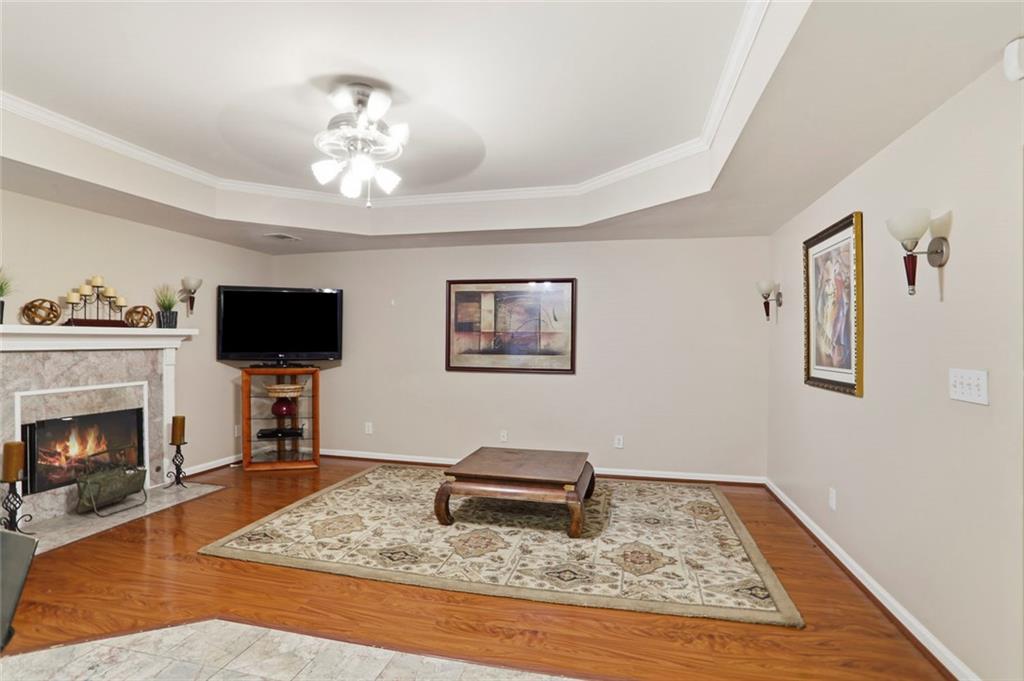 632 Grande View Stone Mountain, GA 30087 - Photo 35 of 46 a living room with furniture and a fireplace
