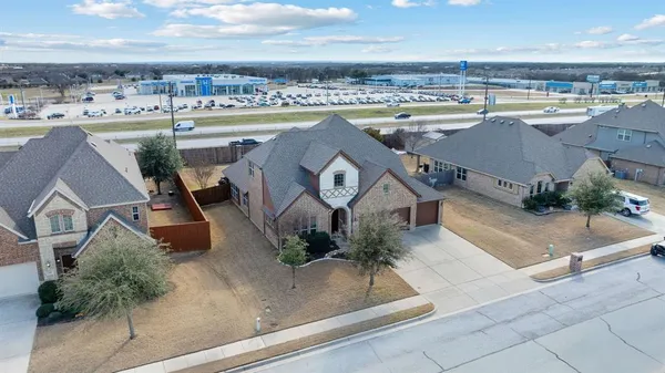 an aerial view of a swimming pool and outdoor space