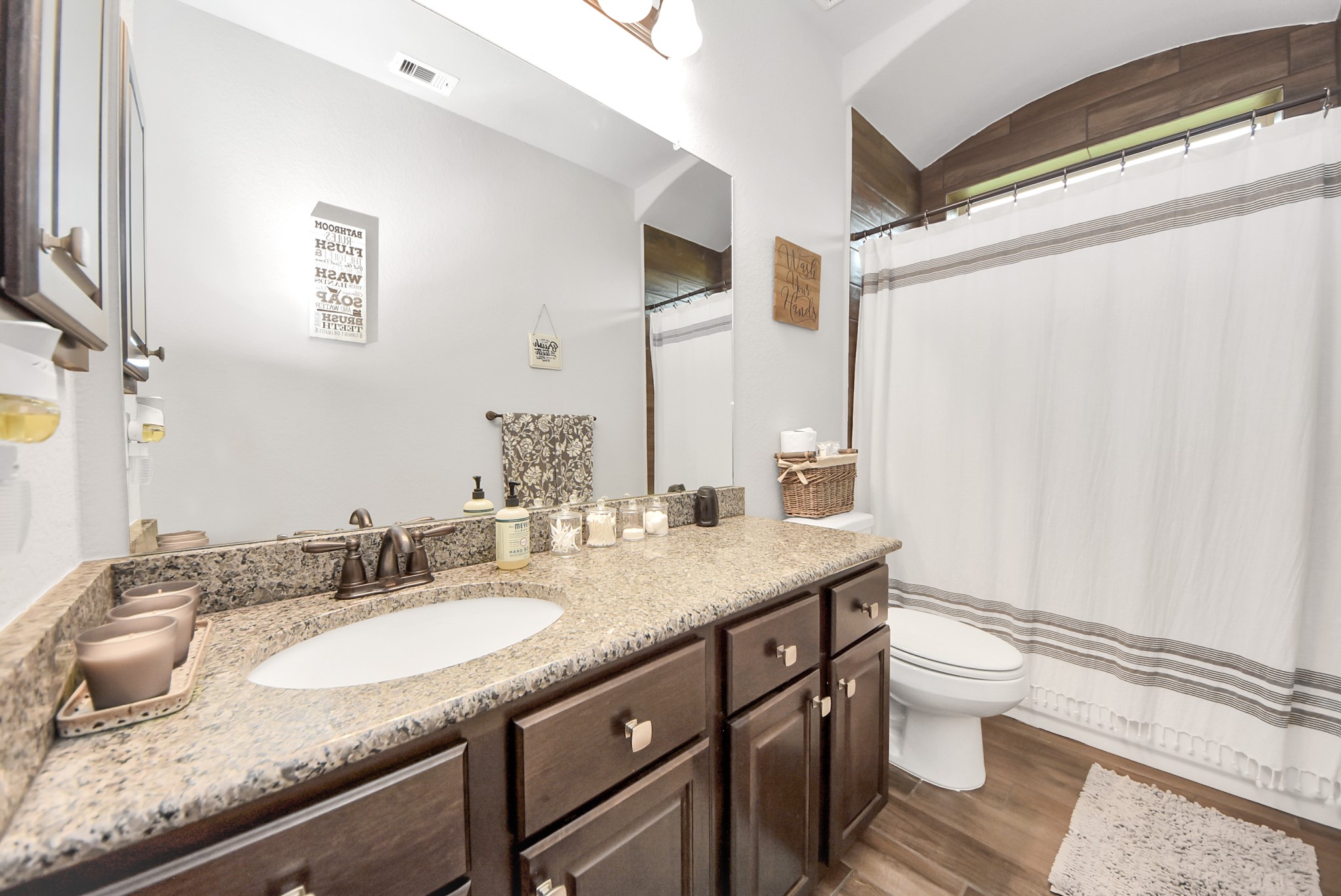 24503 Eucalyptus Way Spring, TX 77373 - Photo 12 of 27 a bathroom with a granite countertop sink toilet and shower